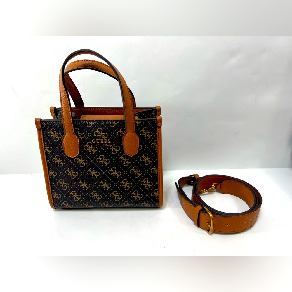 Beautiful guess brown and black hand bag.